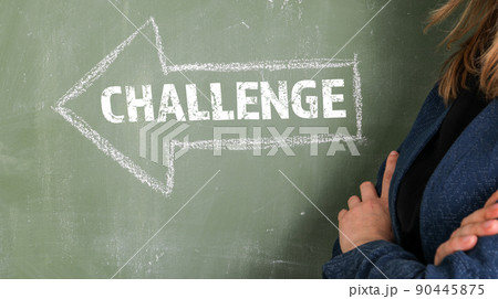 CHALLENGE. Arrow with text on a green chalk board CHALLENGE. Arrow with text on a green chalk board 90445875