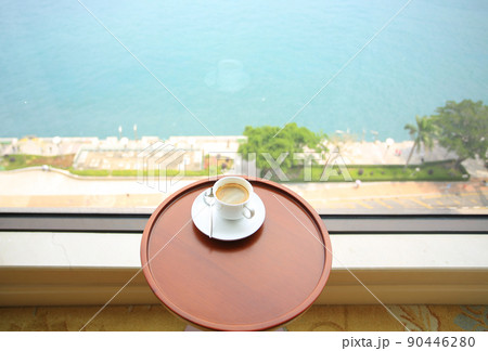 a cup of coffee with the street view 90446280