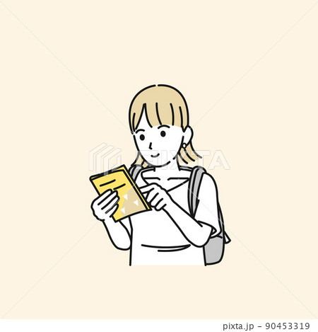 地図　ガイドブックを見る　旅行をする若い女性　一人旅 90453319