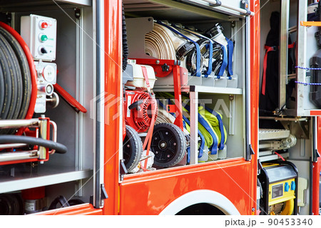 Side view of firetruck with equipment for rescue operations. Katy Wroclawskie, Poland - May 28, 2022 90453340