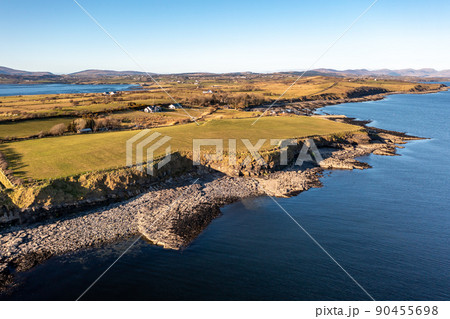 Aerial view of the amazing rocky coast at Ballyederland by St Johns Point in County Donegal - Ireland. Aerial view of the amazing rocky coast at Ballyederland by St Johns Point in County Donegal - Ireland. 90455698