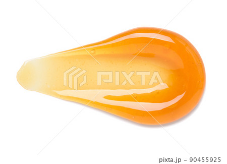 Orange gel smear with bubbles isolated on white background top view 90455925