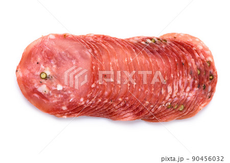 Dried smoked salami sausage slices stack with pepper isolated on white background top view 90456032