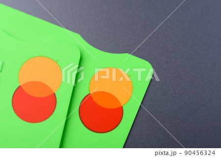 Close-up two MasterCard credit cards with new logo 90456324