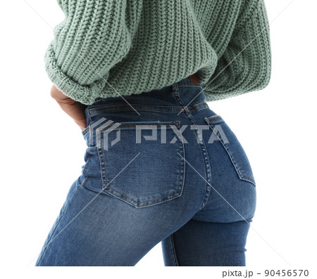 Woman wearing jeans on white background, closeup 90456570