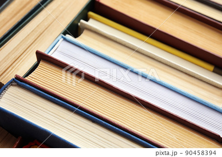 Many different hardcover books as background, closeup Many different hardcover books as background, closeup 90458394