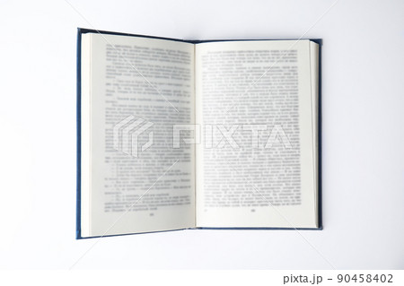 Open book on white background, top view Open book on white background, top view 90458402
