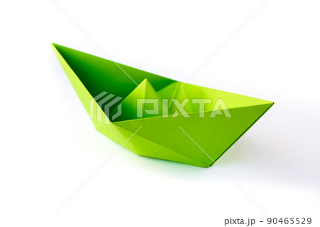 Green paper boat origami isolated on a white background 90465529
