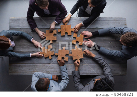 Business teamwork with puzzle 90468821