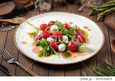 Cherry tomato and mozzarella cheese salad Cherry tomato and mozzarella cheese salad 90468869