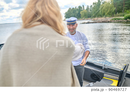A mature couple spending time at the river 90469727