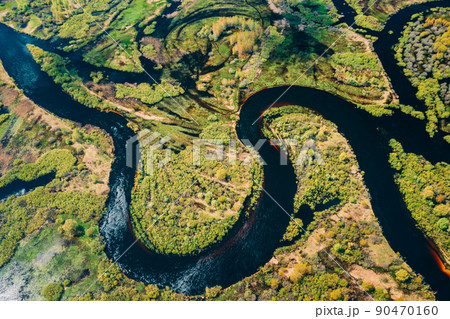 Aerial View Green Forest Woods And River Landscape In Sunny Spring Day. Top View Of Nature In Springtime Season. Bird's Eye View. Beautiful spring landscape 90470160