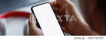 Man search for information on device 90470359