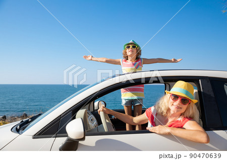 Happy family travel by car on summer vacation Happy family travel by car on summer vacation 90470639