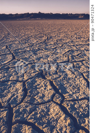 Cracked earth, desertification process,abstract background Cracked earth, desertification process,abstract background 90471324