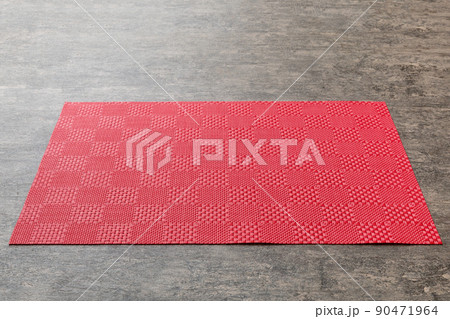 Perspective view of red tablecloth for food on cement background. Empty space for your design 90471964