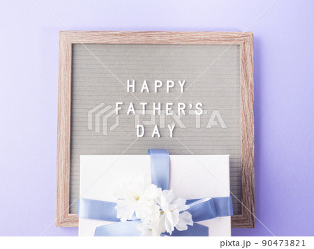 Fathers day purple greeting card with text on letter board 90473821
