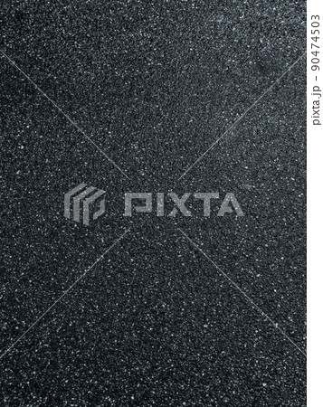 Texture dark wet asphalt after rain close-up 90474503