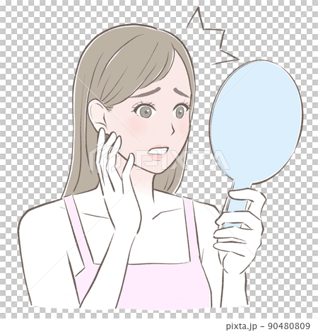 A woman shocked by a sunburn looking in a hand mirror 90480809