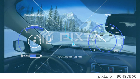 Image of speedometer, gps and charge data on interface, over car interior in winter landscape Image of speedometer, gps and charge data on interface, over car interior in winter landscape 90487900