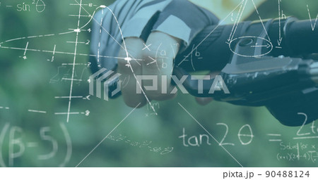 Mathematical equations and diagrams against person holding handlebars of his cycle 90488124