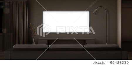 Wide lcd tv screen in dark living room at night Wide lcd tv screen in dark living room at night 90488259