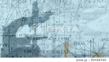 Image of mathematical equations over microscope in classroom Image of mathematical equations over microscope in classroom 90488490