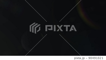 Image of white light with beam and prismatic lens flare on black background Image of white light with beam and prismatic lens flare on black background 90491021