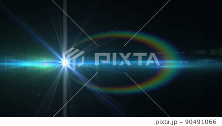 Image of white light with beam and curved prismatic lens flare on black background 90491066