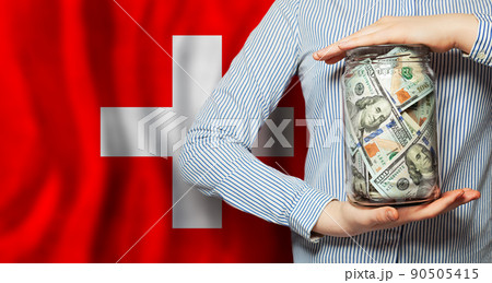US dollars cash money in glass jar. Banking, business and currency exchange in Switzerland US dollars cash money in glass jar. Banking, business and currency exchange in Switzerland 90505415