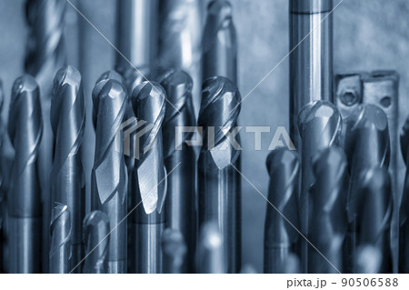 Close-up scene the used solid carbide endmill tools for CNC milling machine. Close-up scene the used solid carbide endmill tools for CNC milling machine. 90506588