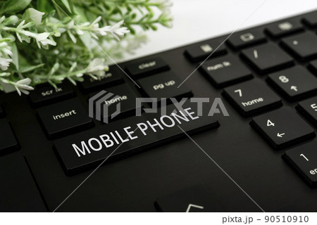 Conceptual display Mobile Phone. Business idea A handheld device used to send receive calls and messages Computer Keyboard And Symbol.Information Medium For Communication. 90510910