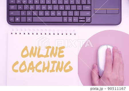 Text showing inspiration Online Coaching. Business concept Learning from online and internet with the help of a coach Office Supplies Over Desk With Keyboard And Glasses And Coffee Cup For Working 90511167