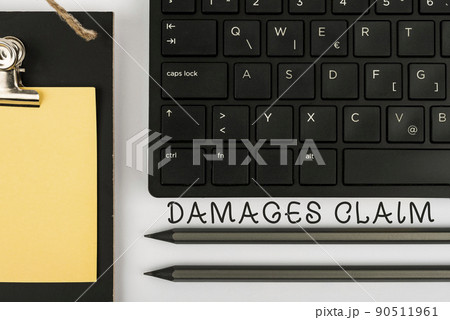 Hand writing sign Damages Claim. Concept meaning Demand Compensation Litigate Insurance File Suit Computer Keyboard And Symbol.Information Medium For Communication. Hand writing sign Damages Claim. Concept meaning Demand Compensation Litigate Insurance File Suit Computer Keyboard And Symbol.Information Medium For Communication. 90511961