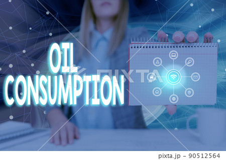 Sign displaying Oil Consumption. Word for This entry is the total oil consumed in barrels per day Lady Pressing Screen Of Mobile Phone Showing The Futuristic Technology Sign displaying Oil Consumption. Word for This entry is the total oil consumed in barrels per day Lady Pressing Screen Of Mobile Phone Showing The Futuristic Technology 90512564