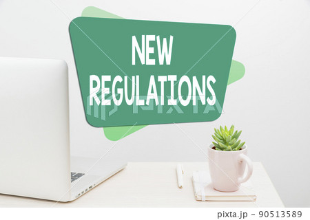 Hand writing sign New Regulations. Business overview Regulation controlling the activity usually used by rules. Tidy Workspace Setup, Writing Desk Tools Equipment, Smart Office 90513589