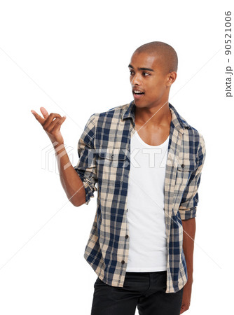 Im telling you, this really works. Cropped shot of a young man standing against a white background. Im telling you, this really works. Cropped shot of a young man standing against a white background. 90521006