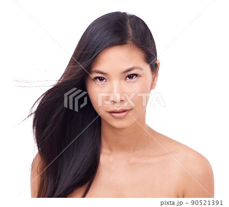 Oriental goddess. Cropped shot of a beautiful young oriental woman against a white background. Oriental goddess. Cropped shot of a beautiful young oriental woman against a white background. 90521391