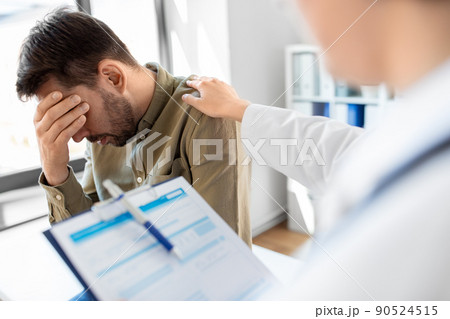 doctor and sad man with health problem at hospital 90524515