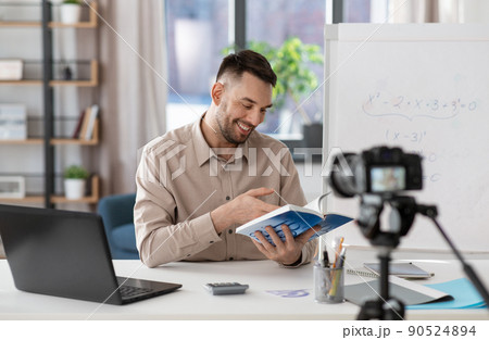 male math teacher having online class at home 90524894