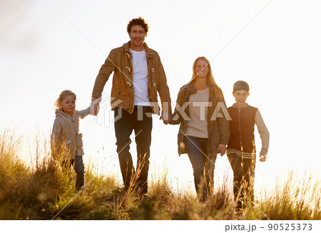 Family is everything. Portrait of a happy family out on a morning walk together. 90525373