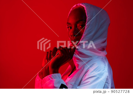 Prove yourself to yourself, not to others. Red filtered shot of a sporty young posing in the studio. Prove yourself to yourself, not to others. Red filtered shot of a sporty young posing in the studio. 90527728