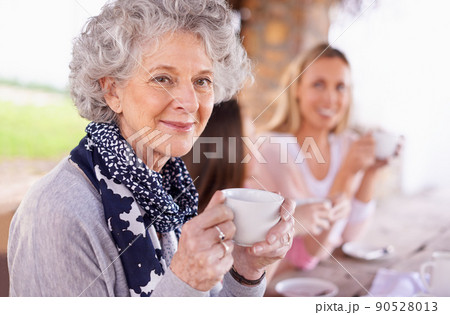 Tea revives you. Shot of three generations of the woman of the women of a family having tea outside. Tea revives you. Shot of three generations of the woman of the women of a family having tea outside. 90528013