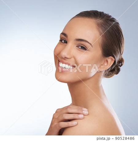 Absolute beauty. A young woman smiling at the camera. Absolute beauty. A young woman smiling at the camera. 90528486