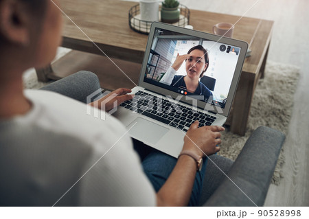 Headaches are often the cause of that. Shot of an unrecognizable person on a videocall with a doctor. Headaches are often the cause of that. Shot of an unrecognizable person on a videocall with a doctor. 90528998