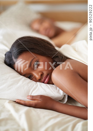 Its morning. Shot of a beautiful young woman in her bedroom. Its morning. Shot of a beautiful young woman in her bedroom. 90529222