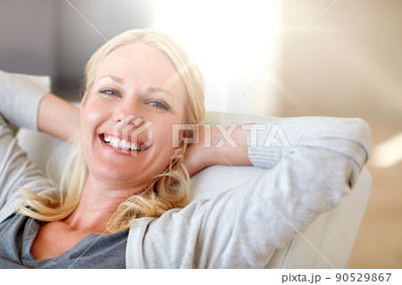 I love a day off. Portrait of a woman relaxing at home. 90529867