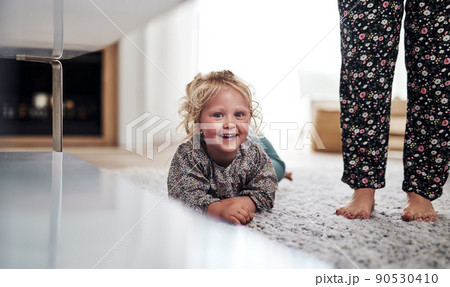 Can you help me convince my mum to join me. Cropped portrait of an adorable little girl bonding with her mother during a day at home. 90530410