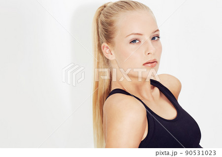 Natural beauty. Gorgeous young blonde woman isolated on white. 90531023