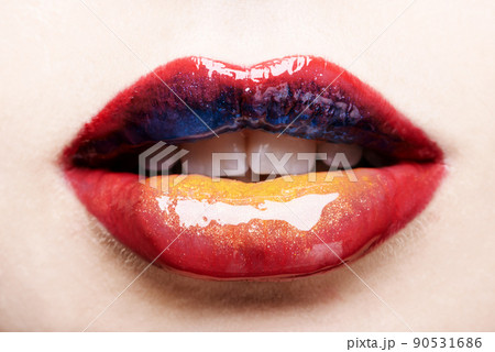 Youll never forget these lips. Cropped shot of a womans multicoloured lips. 90531686